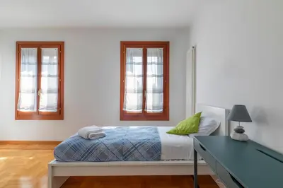 Letto o letti in una camera di Minuetto Apartment - 2 bedrooms
