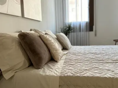 Letto o letti in una camera di ST. ALVISE SUITE