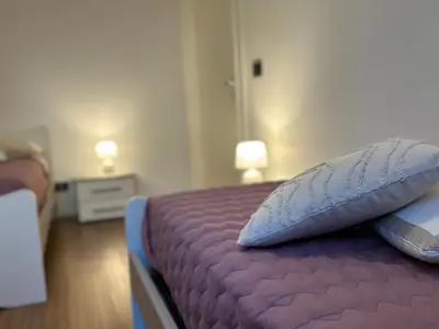 Letto o letti in una camera di ST. ALVISE SUITE