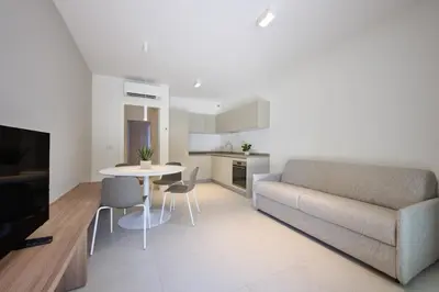 Area soggiorno di Sun Village Apartments