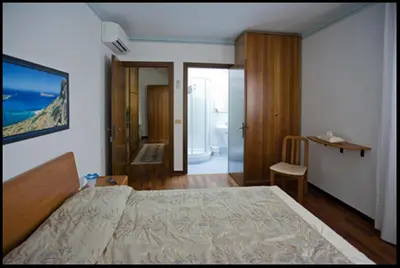 Letto o letti in una camera di B&B Oasi di Venezia