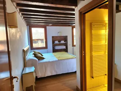 Letto o letti in una camera di Lo Squero apt