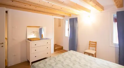 Letto o letti in una camera di Dimora Brasiola - Isola di Pellestrina Ve