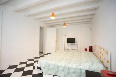 Letto o letti in una camera di Dimora Amos - Isola di Pellestrina Ve