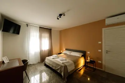 Letto o letti in una camera di Martina’s Rooms