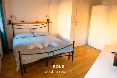 Letto o letti in una camera di Sole & Luna apartments