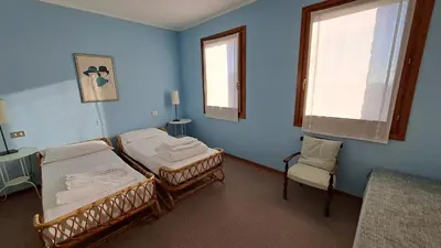 Letto o letti in una camera di Casa Alba