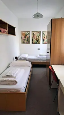 Letto o letti in una camera di Casa Alba