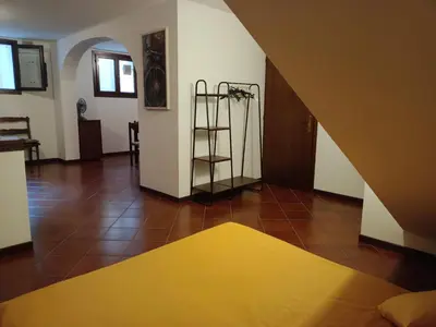 Letto o letti in una camera di La taverna di Anna