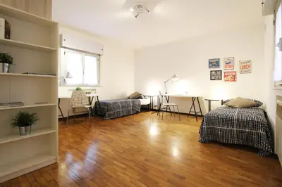 Letto o letti in una camera di Villa Andrea