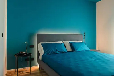 Letto o letti in una camera di Camoma Aparthotel - Suites Apartments