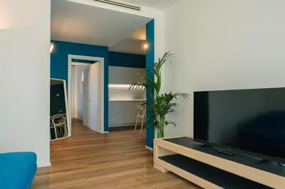 TV o dispositivi per l'intrattenimento presso Camoma Aparthotel - Suites Apartments