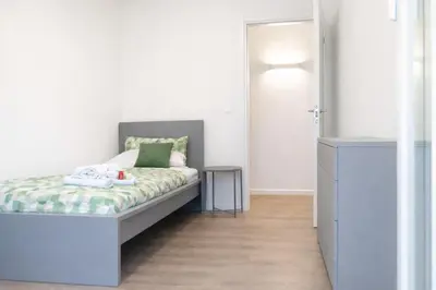 Letto o letti in una camera di Ca' Martha - A due passi dal centro con parcheggio privato