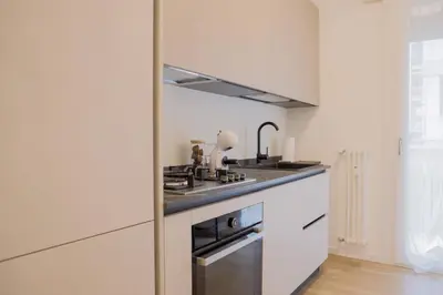 Cucina o angolo cottura di Ca' Martha - A due passi dal centro con parcheggio privato