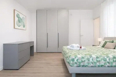 Letto o letti in una camera di Ca' Martha - A due passi dal centro con parcheggio privato