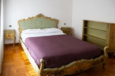 Letto o letti in una camera di Di Ale Elegant House