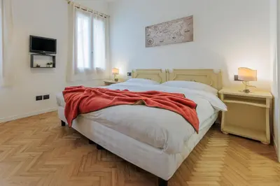 Letto o letti in una camera di Villa Luccon - Mirano Centro Storico