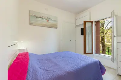Letto o letti in una camera di Mussato Romantic River Flat x2 - con vista sul fiume