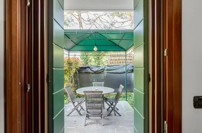 Patio o area all'aperto di GuestHost - Sweety Kalimera House with Private Parking&Garden!