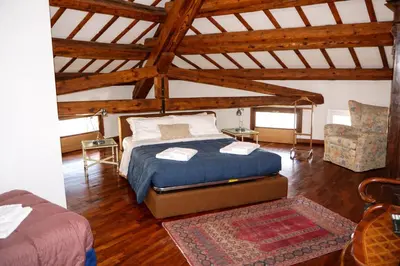 Letto o letti in una camera di HT - Casa del Poeta nel cuore di Padova