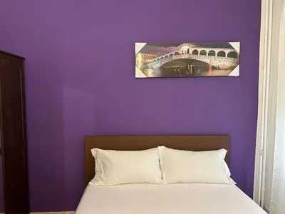 Letto o letti in una camera di Venice Night 25 Via Milano