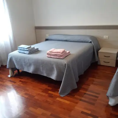 Letto o letti in una camera di Casa Franci