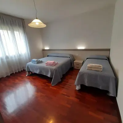 Letto o letti in una camera di Casa Franci