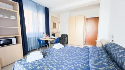 Letto o letti in una camera di Le Due Farfalle by Ca-Sa Check