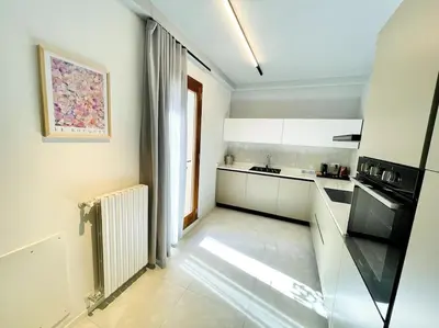Cucina o angolo cottura di Locatelli Apartments - Patio living 