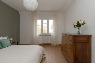 Letto o letti in una camera di enJoy Home - Appartamento signorile con vista