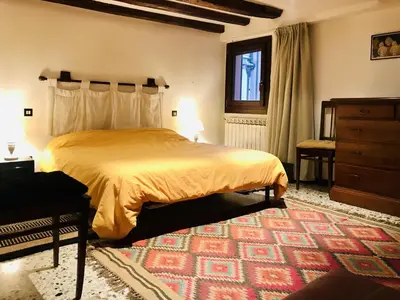 Letto o letti in una camera di Remedio - LOCAPPART