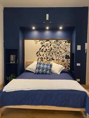 Letto o letti in una camera di Blue Suite