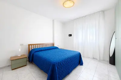 Letto o letti in una camera di Appartamento Shopping Center - Carraro Immobiliare - Family Apartments