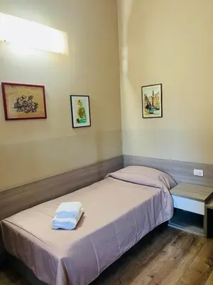 Letto o letti in una camera di Locanda Munerato