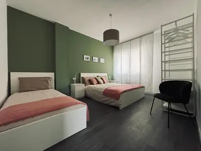 Letto o letti in una camera di Ca' D'Amore