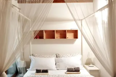 Letto o letti in una camera di Miracoli