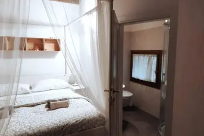 Letto o letti in una camera di Miracoli