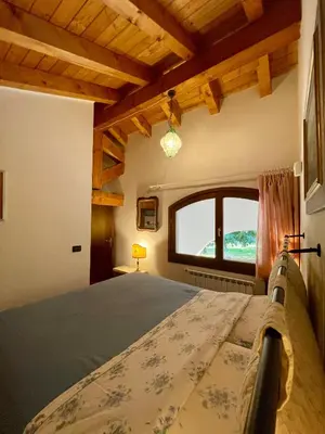 Letto o letti in una camera di La casa nel parco