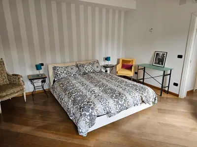 Letto o letti in una camera di Casa Rossa vista canale
