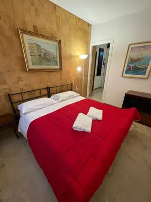 Letto o letti in una camera di Lovenice Center Royalclass