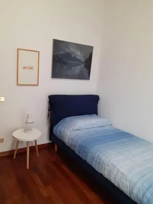 Letto o letti in una camera di Casa vacanze La Madonnetta