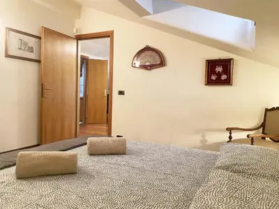 Letto o letti in una camera di Ca' Murazzi