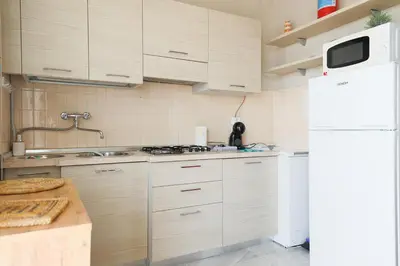 Cucina o angolo cottura di {Lux Kobler} - Luminoso Appartamento Fronte mare