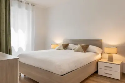 Letto o letti in una camera di LUME, Family Apartment