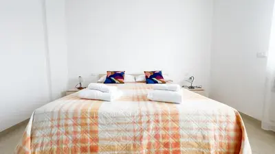 Letto o letti in una camera di Esperia Apartment by Ca-Sa Check