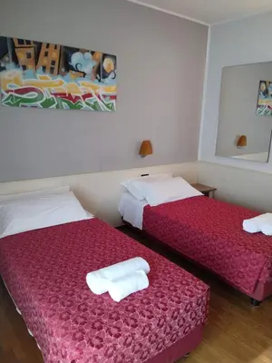 Letto o letti in una camera di Hotel Xibana