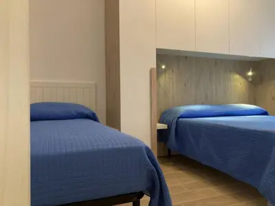 Letto o letti in una camera di Modern flat in the centre of Rosolina Mare