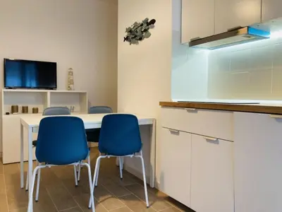 Cucina o angolo cottura di Modern flat in the centre of Rosolina Mare