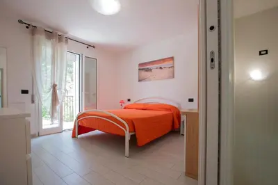 Letto o letti in una camera di Villa Mimosa