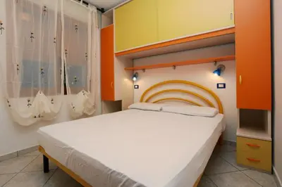 Letto o letti in una camera di Villa Bianca